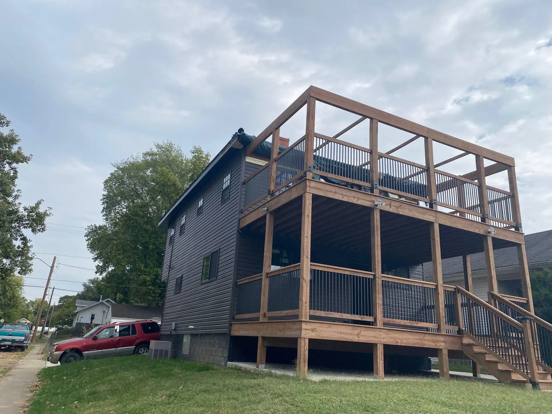 Custom timber porch framing installed during residential home renovation project in Springfield, IL