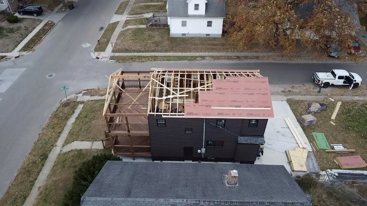 Aerial view of new roof framing and ZIP System roof sheathing installation in Springfield, IL