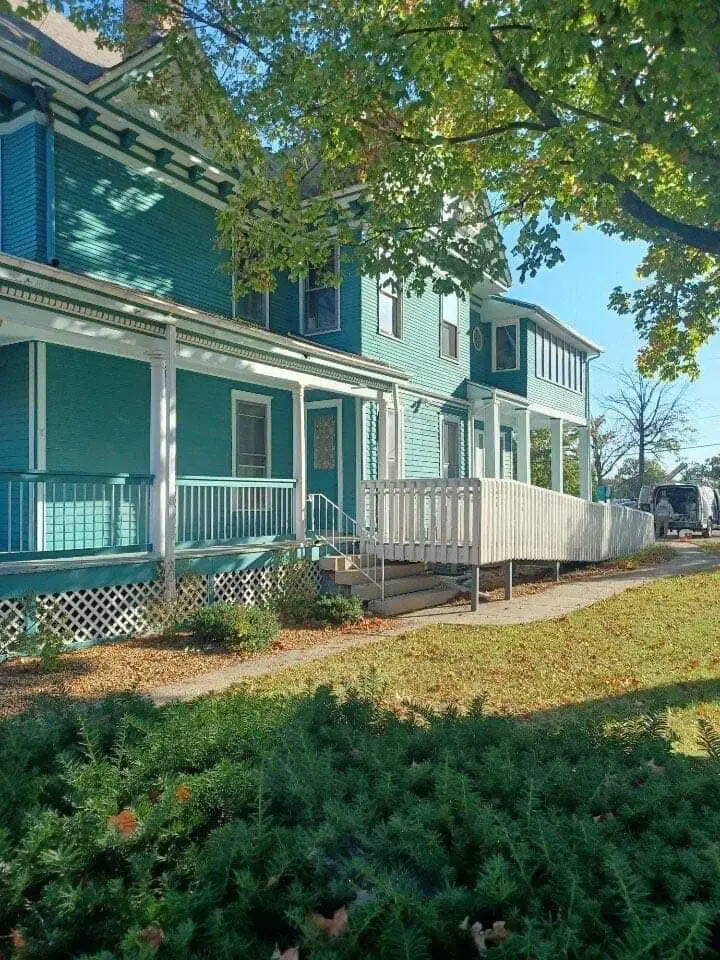 Side entrance and accessible ramp at restored historic commercial building in Springfield, IL