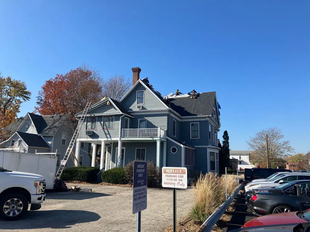 Historic commercial building undergoing roof replacement and exterior restoration in Springfield, IL