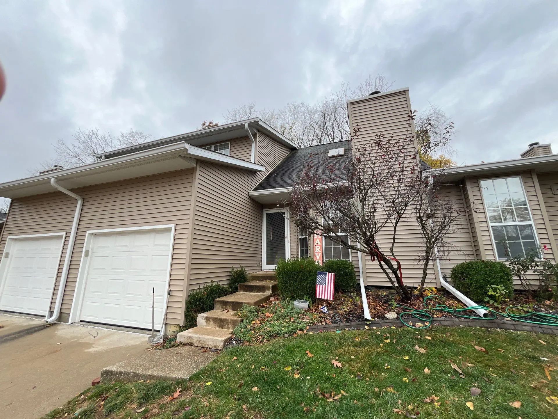 Wide view of home before vinyl siding replacement project in Springfield, IL