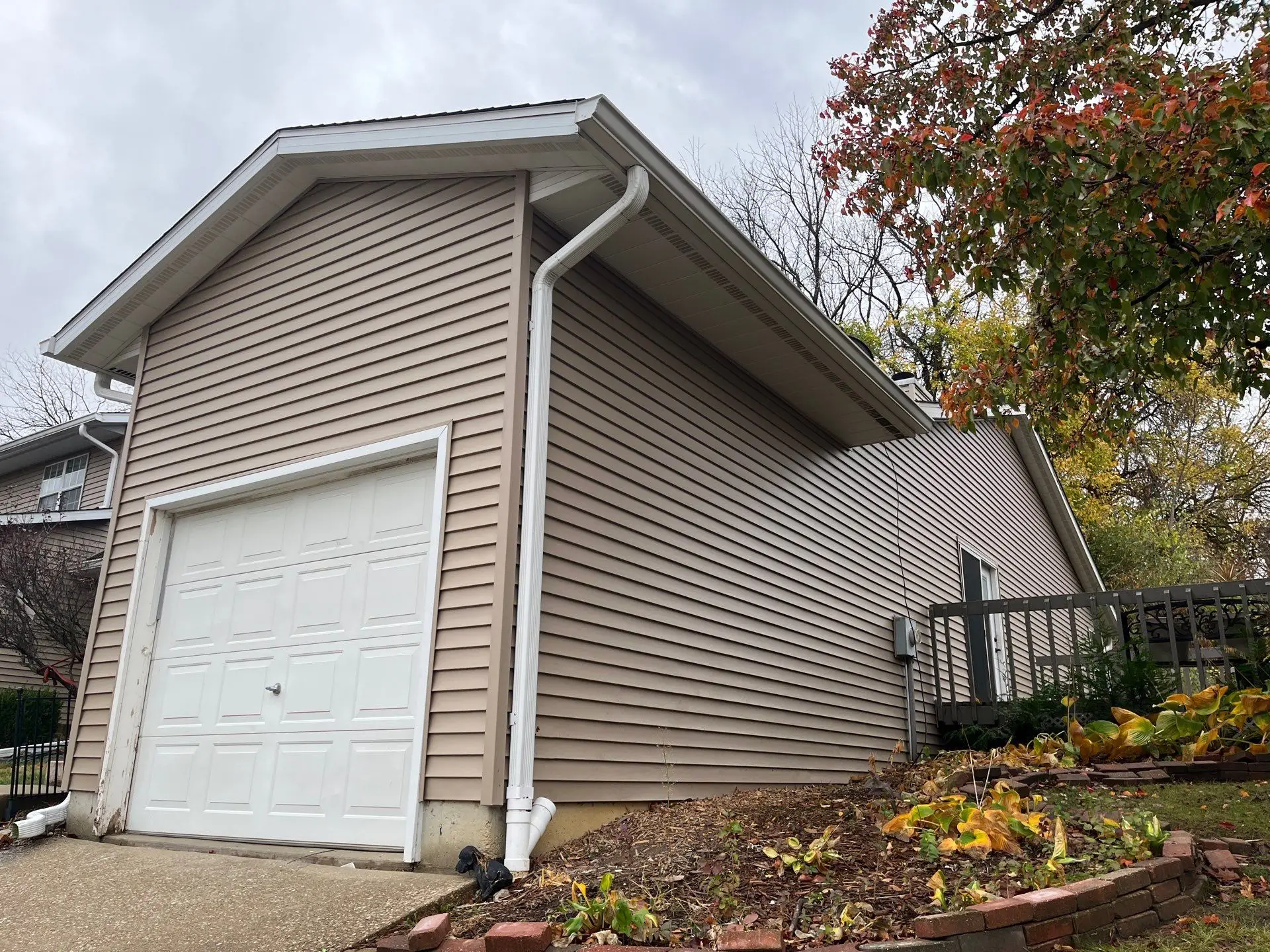 New vinyl siding installed on garage addition during exterior renovation in Springfield, IL