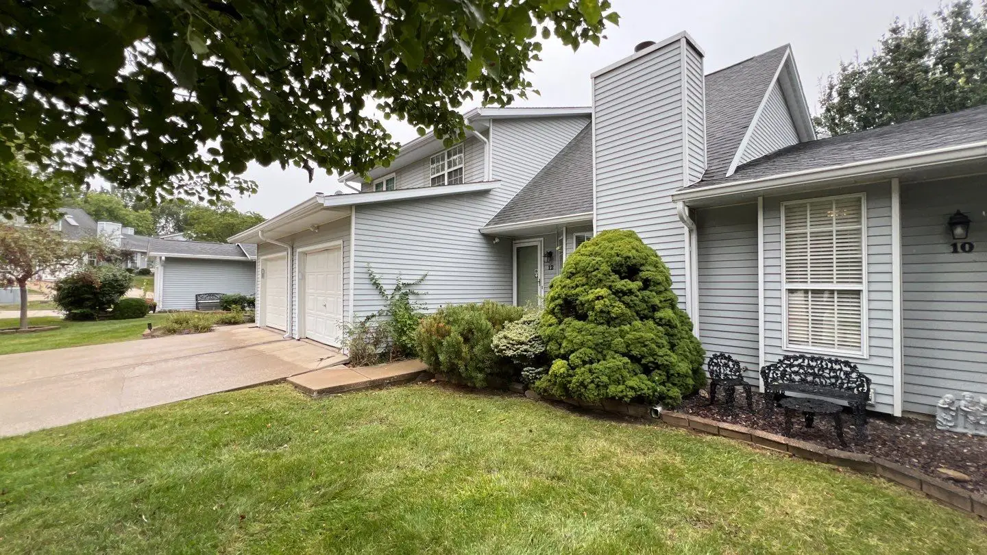 Residential townhouse exterior before new siding installation in Springfield, IL