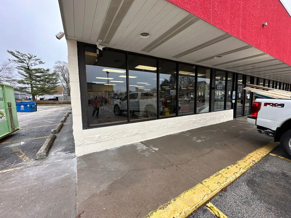 Completed commercial storefront structural repair with restored exterior in Moline, IL