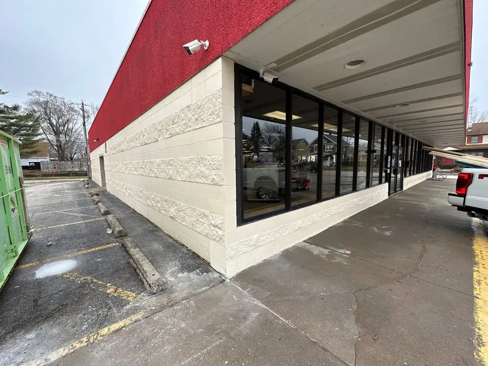 Finished commercial building exterior after storefront renovation project in Moline, IL