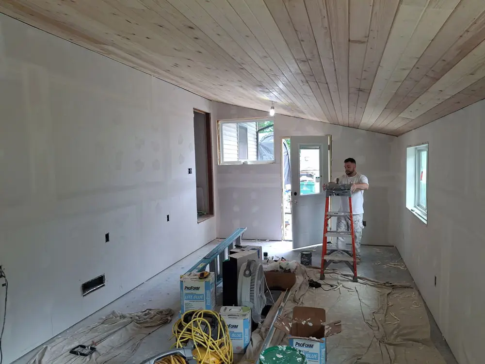 Interior drywall finishing and ceiling installation during home remodel in Springfield, IL
