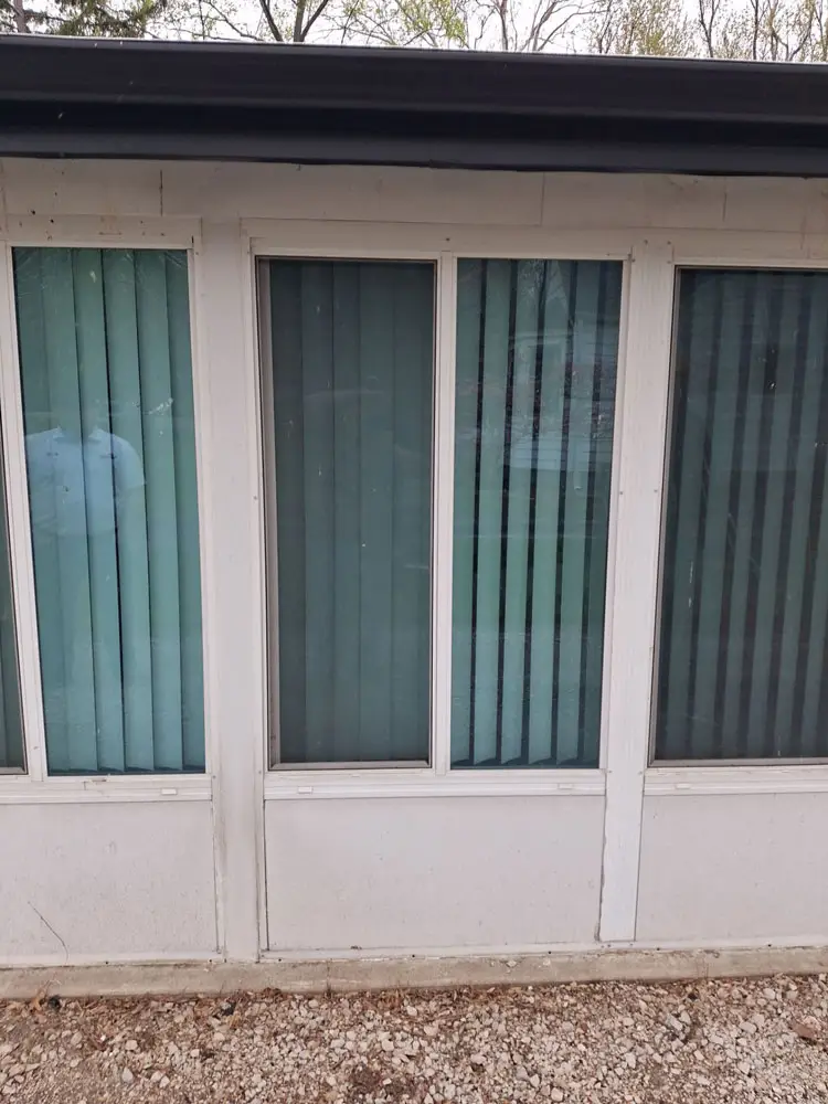 Existing sunroom windows before renovation and replacement in Springfield, IL